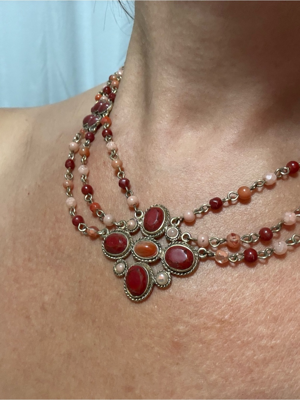 Monet Multi-Strand Red and Coral Beaded Necklace with Decorative Pendant